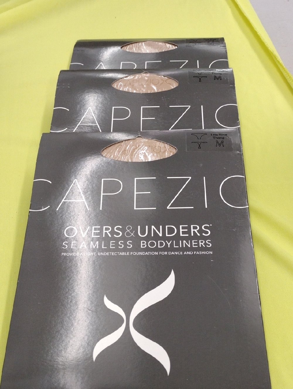 Capezio Women's Seamless Thong.  Color Nude. 3 Pair. Size M.